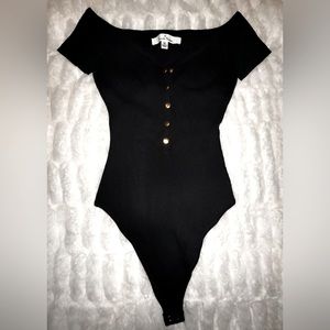 🔥BRAND NEW!!🔥 Black short sleeve bodysuit, button down front, thong style